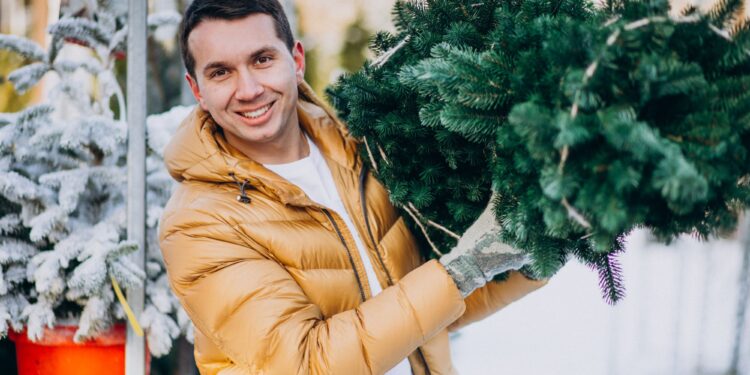 Christmas Market vendor with christmas tree