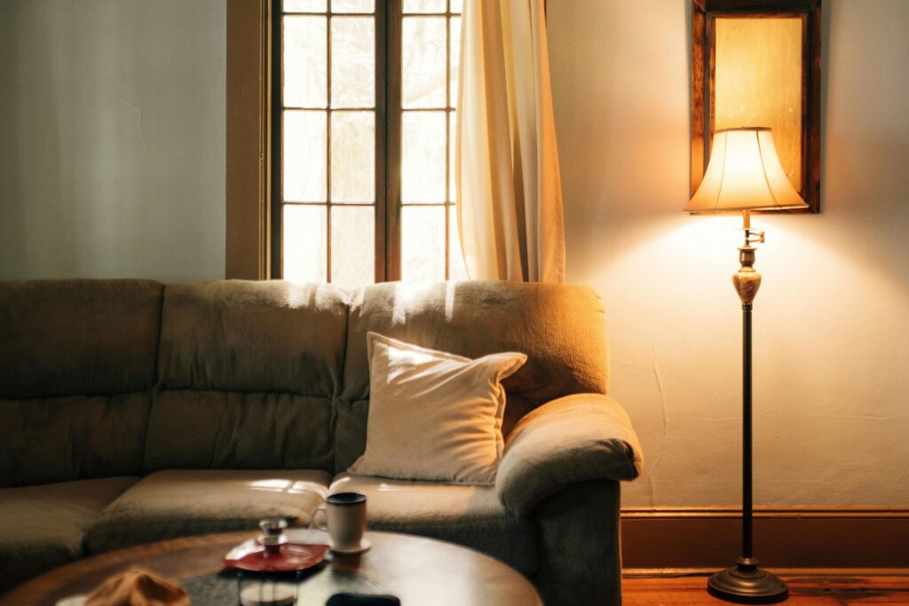 Warm autumn lighting Floor lamps placed behind furniture cast beautiful uplighting effects