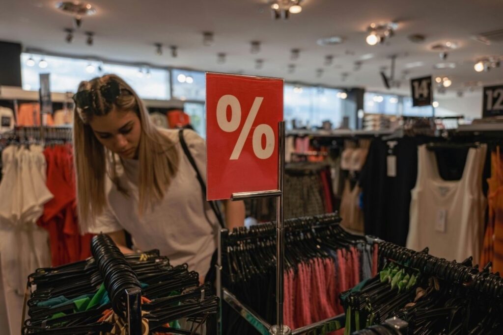 Crowds of shoppers on Oxford Street London during Boxing Day sales on December 26, representing Britain's largest annual shopping event with massive retail discounts comparable to Black Friday