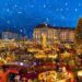 Traditional German Christmas markets with festive wooden chalets and twinkling lights beneath Cologne Cathedral, showcasing authentic European holiday traditions with mulled wine and handcrafted gifts