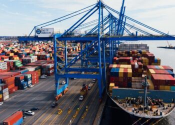 Logistics hub Rotterdam with port expansion handling container ships and European supply chain operations