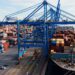 Logistics hub Rotterdam with port expansion handling container ships and European supply chain operations