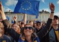 European citizens celebrating unity and prosperity at an outdoor Europe Day 2026 public event
