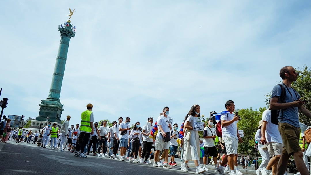 Visitors walk past an iconic urban landmark in a European host city during a European athletics festival week.