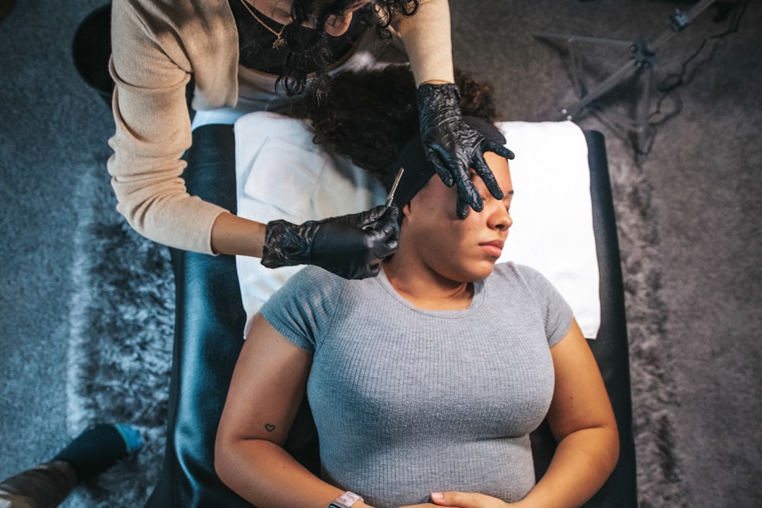 A dermatologist reviewing EU skincare product labels with a patient during a consultation