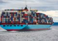 Large cargo container ship at sea transporting goods across European waters, representing EU single market trade and logistic