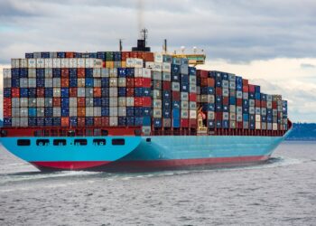 Large cargo container ship at sea transporting goods across European waters, representing EU single market trade and logistic