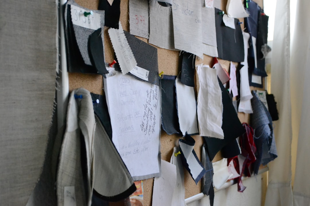 A designer reviewing recycled fibre samples produced through an EU textile recycling programme