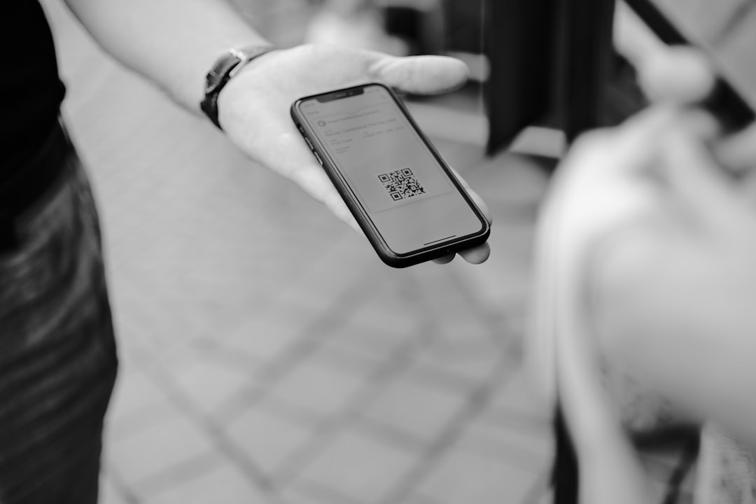 A shopper scans a QR code on a garment label to verify the traceability credentials of a circular fashion brand.