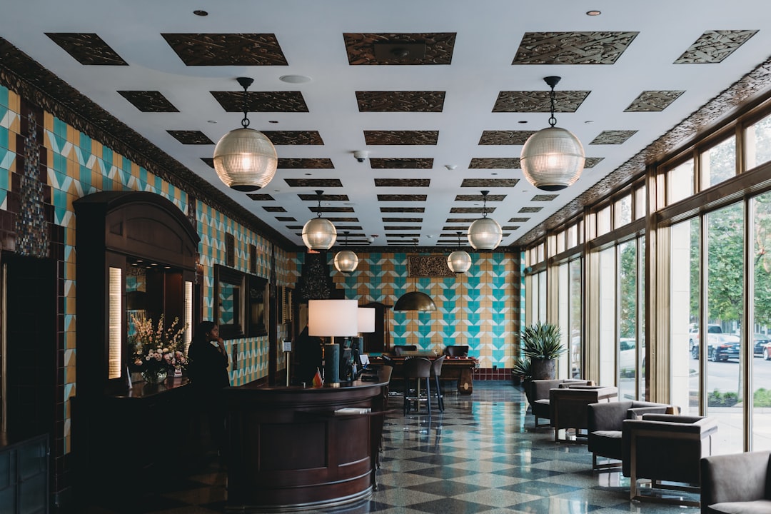 A family checking into an eco-certified European hotel to lower their carbon footprint during summer travel