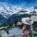 one of the EU's most scenic mountain villages on a clear July morning, surrounded by green peaks.
