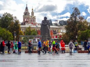A city official speaks to participants at an outdoor European Week of Sport community event