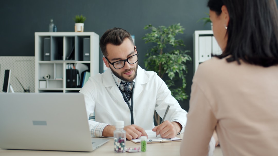 A dermatologist advising a patient on SPF labelling requirements and choosing the right European sunscreen.