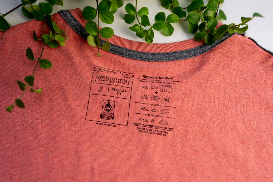 A conscious shopper reading an organic textile certification tag before making a purchase decision