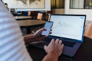 Investor checking STOXX 600 results during earnings season